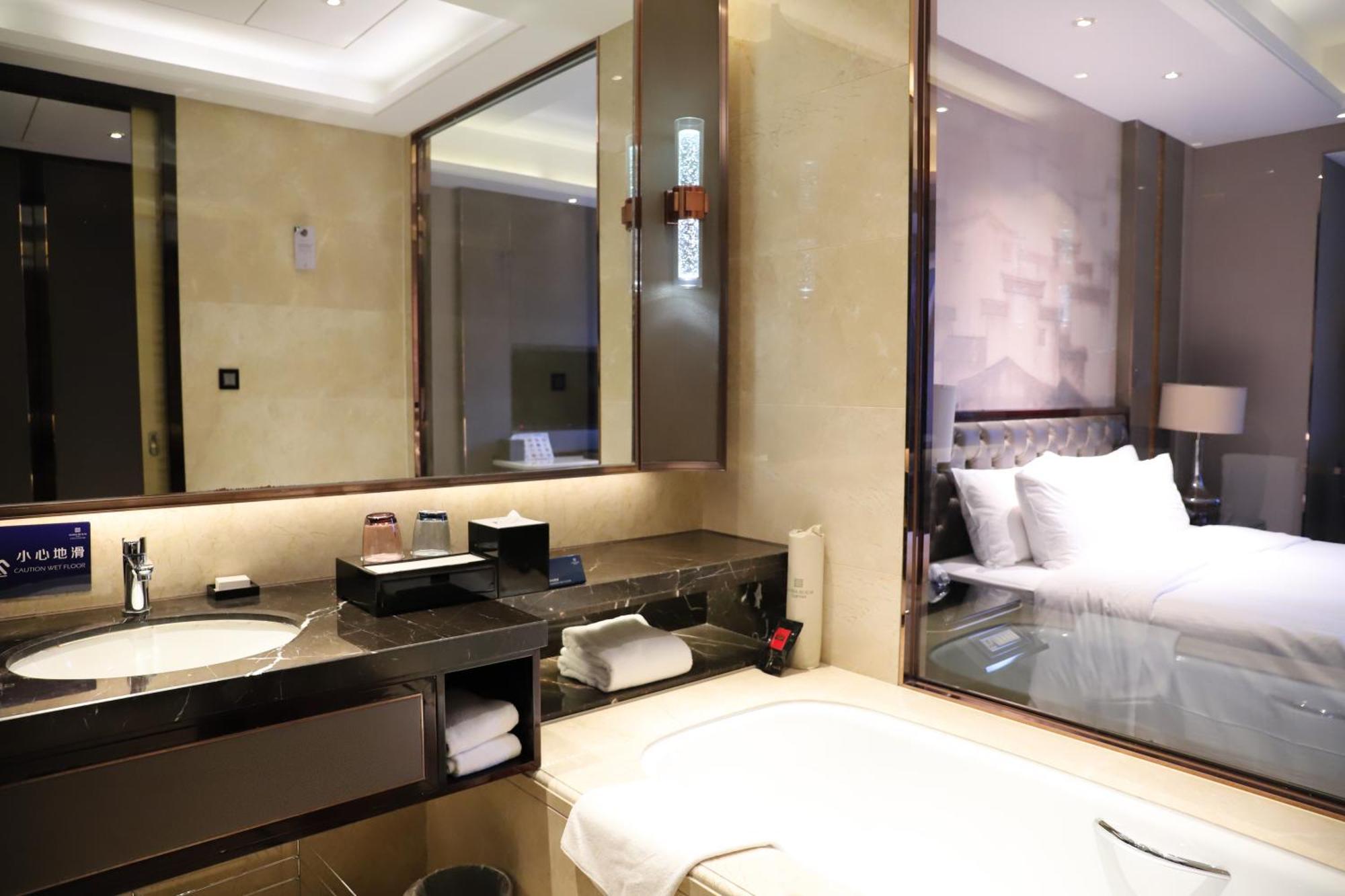 Отель Wanda Realm Jinhua Экстерьер фото